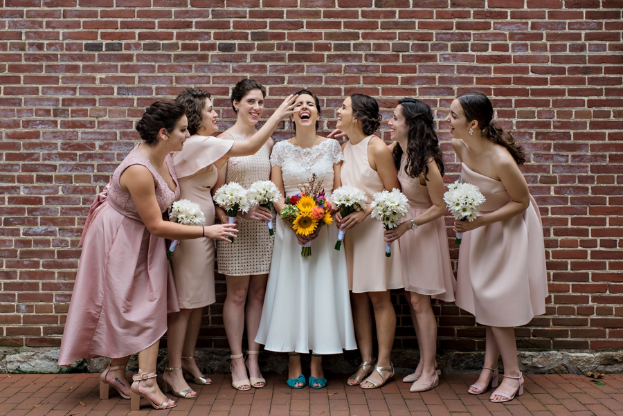 The bridesmaids making the bride feel uncomfortable.